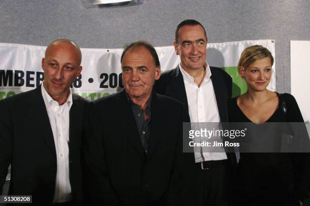 To R) Director Oliver Hirschbiegel, actor Bruno Ganz, writer and producer Bernd Eichinger and actress Alexandra Maria Lara pose for photographers...