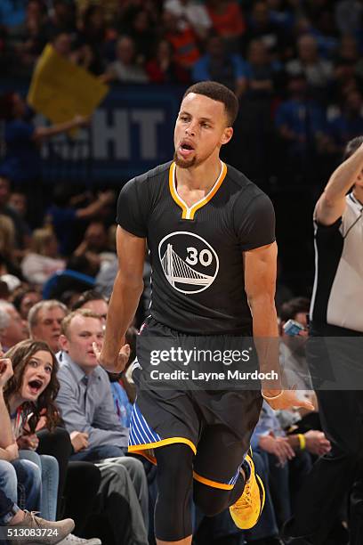 Stephen Curry of the Golden State Warriors celebrates after hitting a three point shot against the Oklahoma City Thunder on February 27, 2016 at the...