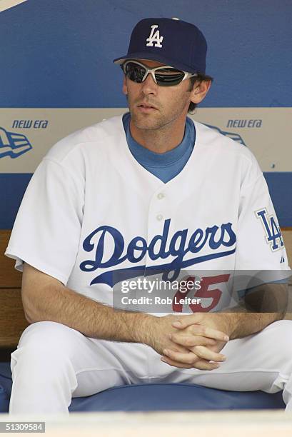 Outfielder Shawn Green of the Los Angeles Dodgers waits in the dugout before the game against the Pittsburgh Pirates at Dodger Stadium on August 5,...