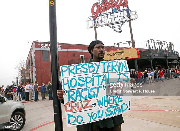 Bennie Jeffery of Dallas wanted to find out where each candidate stood on the issue important to him as he held a sign on the street where Republican...