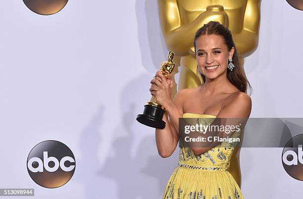 Actress Alicia Vikander, winner of the Best Actress in a Supporting Role award for 'The Danish Girl,' poses in the press room during the 88th Annual...