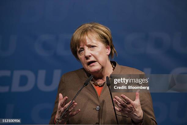 Angela Merkel, Germany's chancellor, speaks while addressing a Christian Democratic Party local election campaign rally in Volkmarsen, Germany, on...