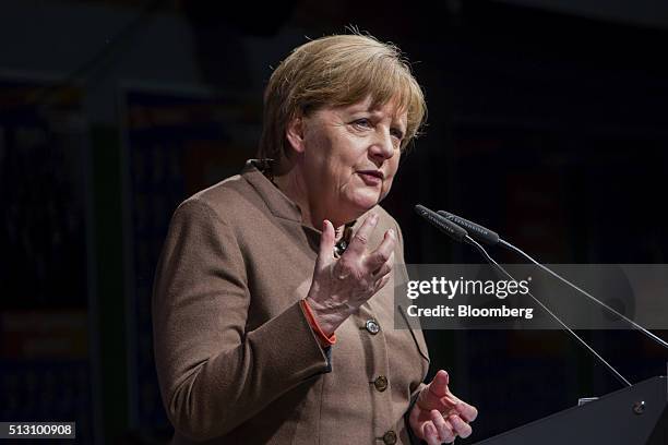 Angela Merkel, Germany's chancellor, speaks while addressing a Christian Democratic Party local election campaign rally in Volkmarsen, Germany, on...