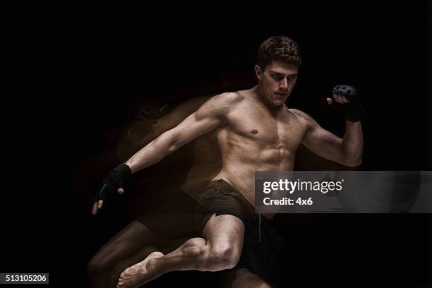 mixed martial arts kicking - mixed boxing bildbanksfoton och bilder