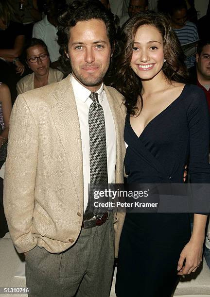 David Warren and actress Emmy Rossum attend the Ralph Lauren show during the Olympus Fashion Week Spring 2005 at Bryant Park September 15, 2004 in...