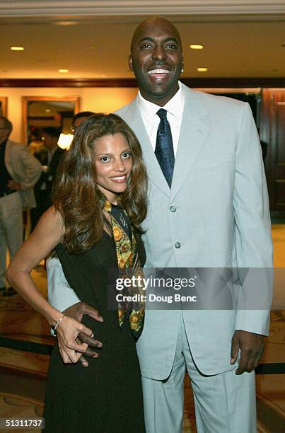 John Salley and his wife Natasha Salley pose for a portrait during the The National Multiple Sclerosis Society's 30th Annual Dinner of Champions to...