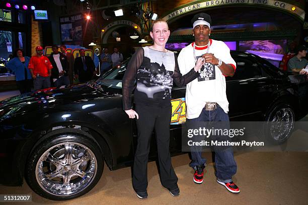 Contest winner Melissa Kennedy receives car keys from singer Nelly as part ofthe Z100 Pimp My Summer Contest at Times Square Studios September 15,...