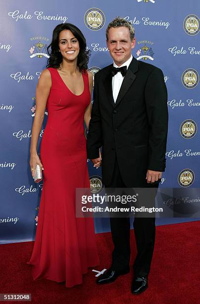 European team player Luke Donald of England with his partner Diane Antonopoulos arriving at the 35th Ryder Cup Matches Gala Dinner at the Fox Theater...