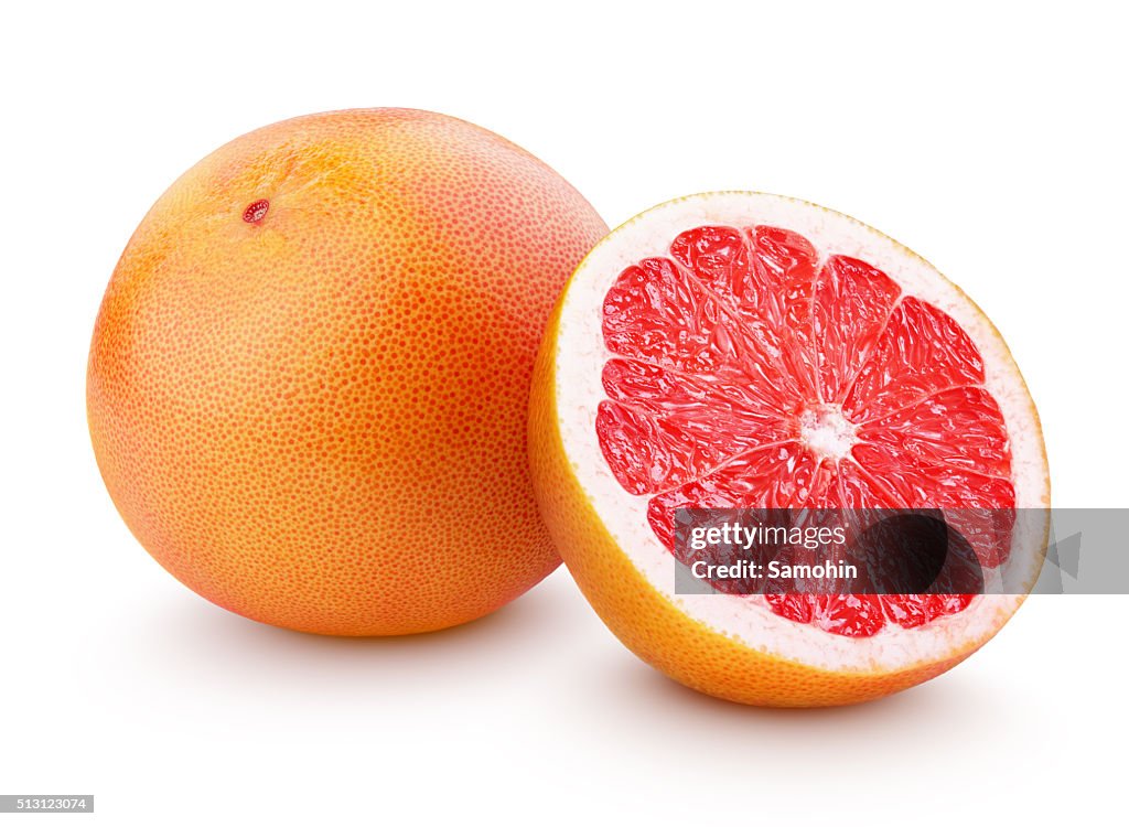 Ripe grapefruit citrus fruit with half isolated on white