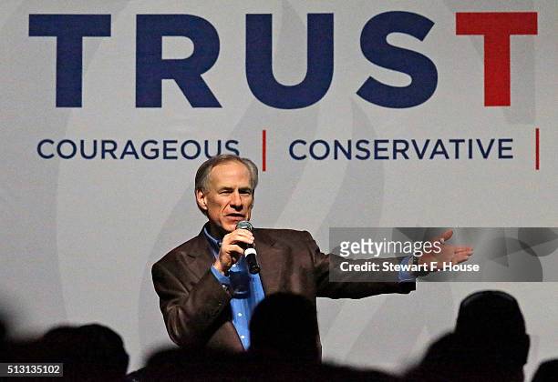 Texas Governor Greg Abbott speaks at a rally by Republican presidential candidate Sen. Ted Cruz at Gilley's Dallas the day before Super Tuesday...