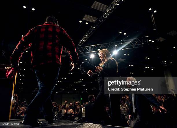 Rep. Keith Ellison , left, introduces Democratic presidential candidate Sen. Bernie Sanders and his wife Jane O'Meara Sanders during a campaign rally...