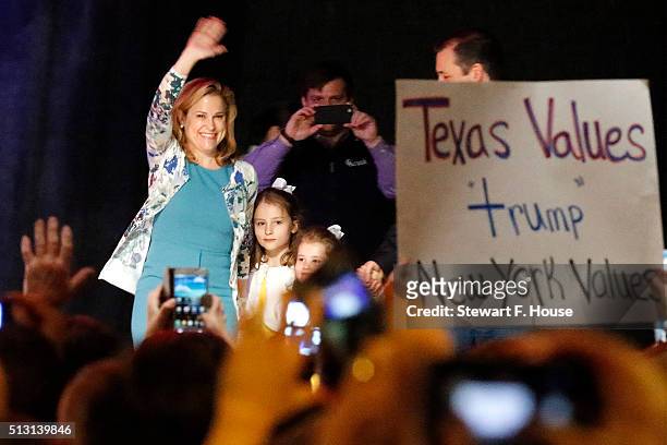 Heidi Nelson Cruz, wife of Republican presidential candidate Sen. Ted Cruz waves on stage at Gilley's Dallas the day before Super Tuesday February...