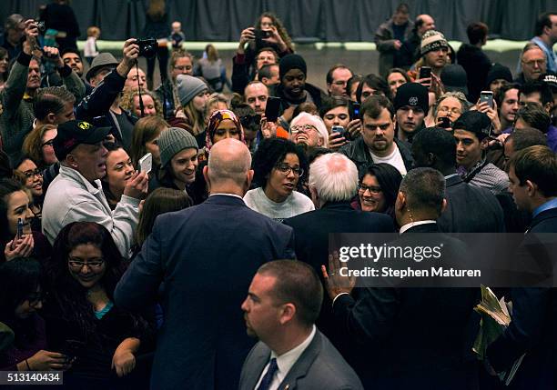 Democratic presidential candidate Sen. Bernie Sanders greets a crowd of supporters after speaking at the Minneapolis Convention Center February 29,...