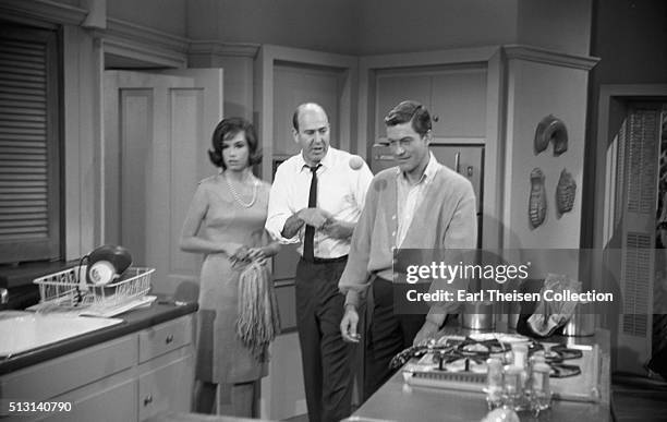 Actors Dick Van Dyke and Mary Tyler Moore with writer, producer, director and actor Carl Reiner in rehearsal for The Dick Van Dyke Show on December...