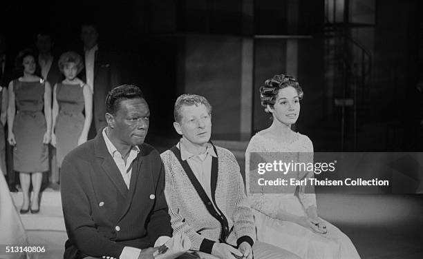 Actress Mary Tyler Moore, singer Nat 'King' Cole and actor Danny Kaye on the set of The Dick Van Dyke Show on December 2, 1963 in Los Angeles,...