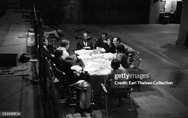 The cast and crew of the The Dick Van Dyke Show conduct a table read of the script on December 2, 1963 in Los Angeles, California.