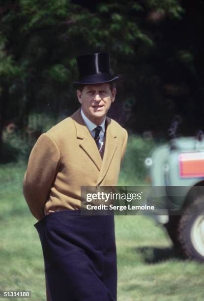 Prince Philip Duke of Edinburgh, wearing an outfit for carriage driving at an equestrian event during the 1980s.