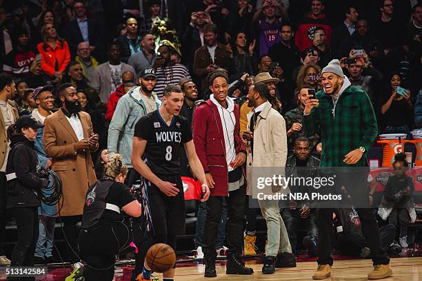 DeMar DeRozan and Karl-Anthony Towns reacts to Zach LaVine of the Minnesota Timberwolves after a dunk during the Verizon Slam Dunk Contest as part of...