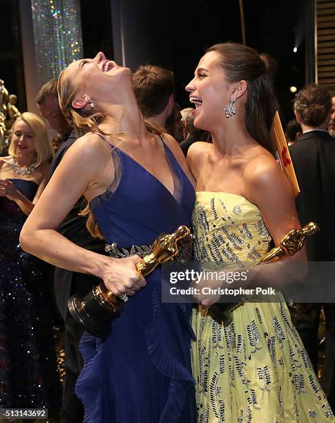 Actresses Brie Larson, winner of the Best Actress award for "Room," and Alicia Vikander, winner of the Best Supporting Actress award for "The Danish...