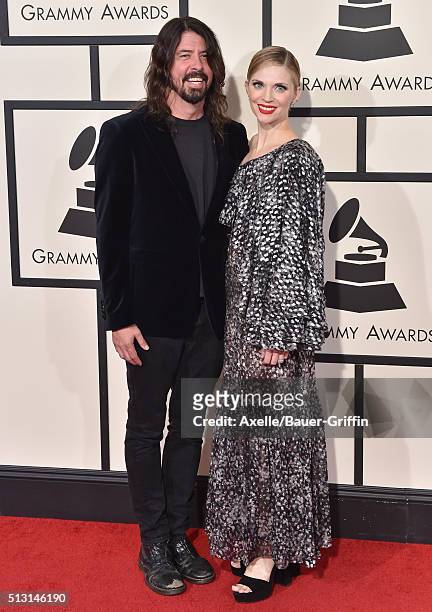 Recording artist Dave Grohl of Foo Fighters and Jordyn Blum arrive at The 58th GRAMMY Awards at Staples Center on February 15, 2016 in Los Angeles,...