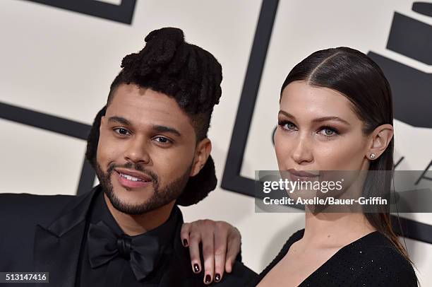 Singer The Weeknd and model Bella Hadid arrive at The 58th GRAMMY Awards at Staples Center on February 15, 2016 in Los Angeles, California.