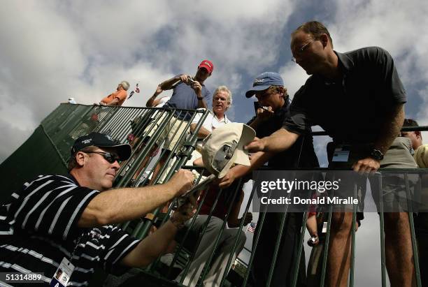 Team captain Hal Sutton signing autographs during the final practice day for the 35th Ryder Cup Matches at the Oakland Hills Country Club on...