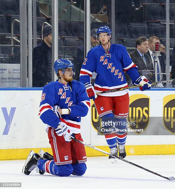 Marc Staal and his brother Eric Staal of the New York Rangers skate in warm-ups prior to the game against the Columbus Blue Jackets at Madison Square...