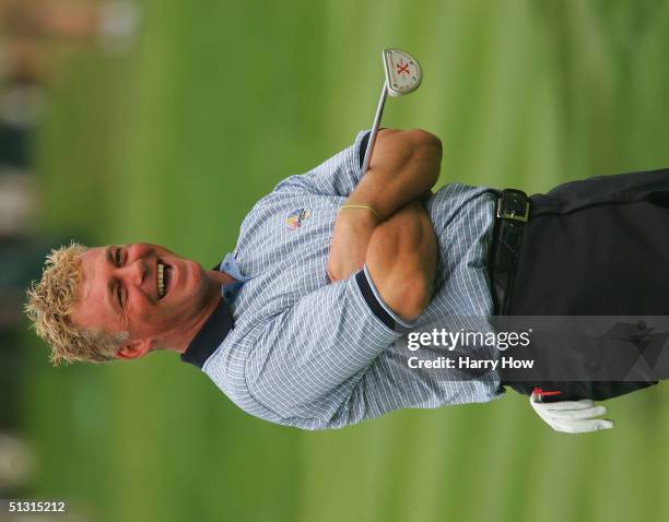 European team player Darren Clarke of Northern Ireland smiles as he looks over a green during the final practice day for the 35th Ryder Cup Matches...
