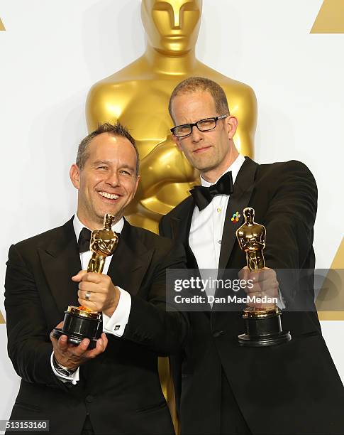 Jonas Rivera and Pete Docter, winners for Best Animated Feature Film for 'Inside Out,' pose in the press room at the 88th Annual Academy Awards at...