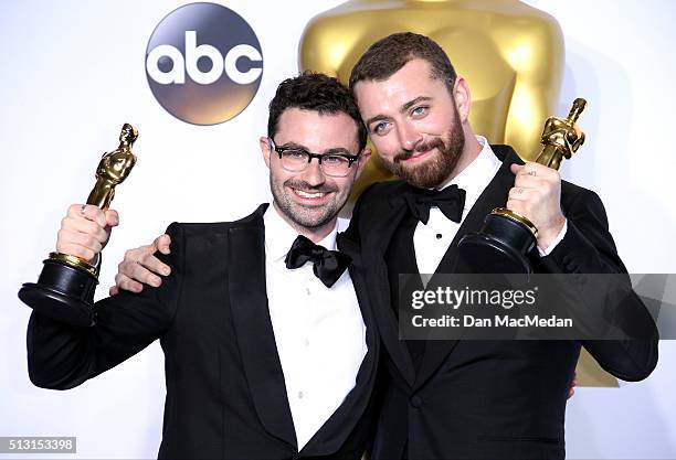 Singer/songwriters Jimmy Napes and Sam Smith, winners for Best Original Song for 'Writing's On The Wall' for 'Spectre,' pose in the press room at the...