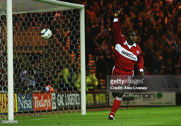 Jimmy Floyd Hasselbaink of Middlesbrough celebrates scoring the first goal during the UEFA Cup first round, first leg match between Middlesbrough and...