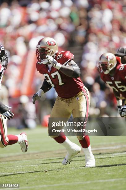 Bryant Young of the San Francisco 49ers runs against the Atlanta Falcons at 3Com Park on September 12, 2004 in San Francisco, California. The Falcons...
