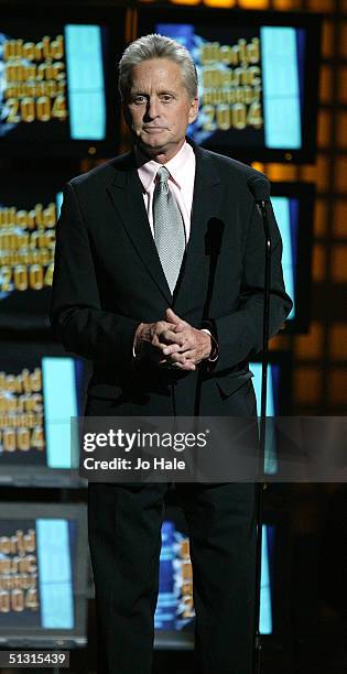 Actor Michael Douglas presents the Diamond Award on stage at the 2004 World Music Awards at the Thomas & Mack Centre on September 15, 2004 in Las...