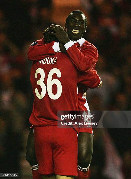 Mark Viduka of Middlesbrough celebrates his second goal with Jimmy Floyd Hasselbaink during the UEFA Cup first round, first leg match between...