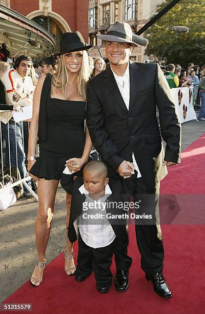 Singer Peter Andre with Jordan and her son Harvey arrive at the "Disney Channel Kids Awards 2004" at the Royal Albert Hall on September 16, 2004 in...