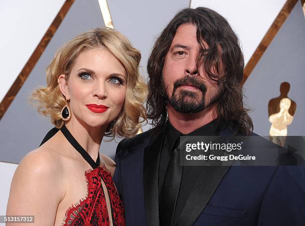 Musician Dave Grohl and wife Jordyn Blum arrive at the 88th Annual Academy Awards at Hollywood & Highland Center on February 28, 2016 in Hollywood,...