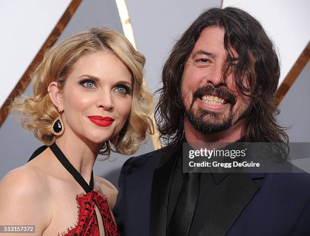 Musician Dave Grohl and wife Jordyn Blum arrive at the 88th Annual Academy Awards at Hollywood & Highland Center on February 28, 2016 in Hollywood,...