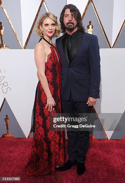 Musician Dave Grohl and wife Jordyn Blum arrive at the 88th Annual Academy Awards at Hollywood & Highland Center on February 28, 2016 in Hollywood,...