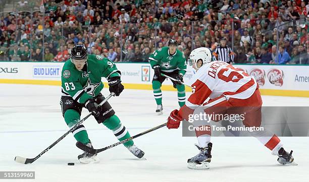 Ales Hemsky of the Dallas Stars controls the puck against Danny DeKeyser of the Detroit Red Wings in the first period at American Airlines Center on...