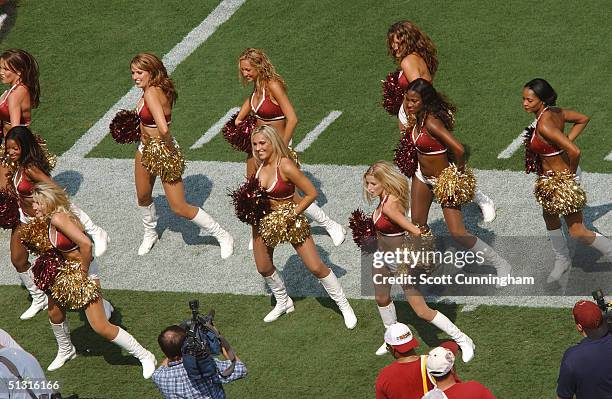 The Washington Redskins cheerleaders perform before the game against the Tampa Bay Buccaneers on September 12, 2004 at FedEx Field in Landover,...