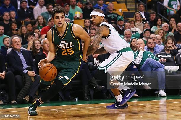 Raul Neto of the Utah Jazz drives against Isaiah Thomas of the Boston Celtics during the third quarter at TD Garden on February 29, 2016 in Boston,...
