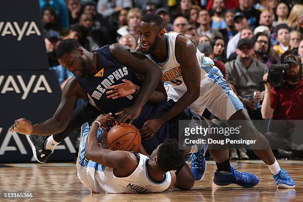Lance Stephenson of the Memphis Grizzlies contests Emmanuel Mudiay and JaKarr Sampson of the Denver Nuggets for a loose ball at Pepsi Center on...