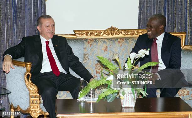 Turkish President Recep Tayyip Erdogan discusses with Ghana's Vice President Kwesi Bekoe Amissah-Arthur during a diplomatic meeting in Accra, on...