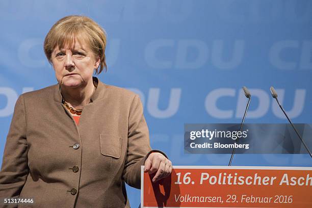 Angela Merkel, Germany's chancellor, stands on stage before addressing a Christian Democratic Party local election campaign rally in Volkmarsen,...