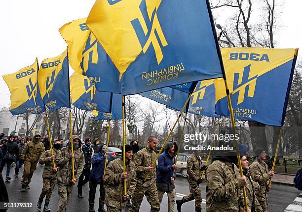 Members and supporters of regiment "Azov" stage a protest against detention of Head of the Civil Corps "Azov-Crimea" Stanislav Krasnov and activist...