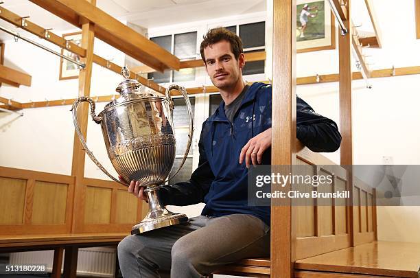 Andy Murray holds the Aegon Championships trophy at The Queens Club Dressing Rooms on February 26, 2016 in London,United Kingdom. Which he will try...