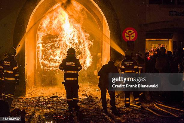 The Chienbäse is part of the Basler Fasnacht, carriers loaded with burning wood are pulled and carried through town, watched by the spectators and...