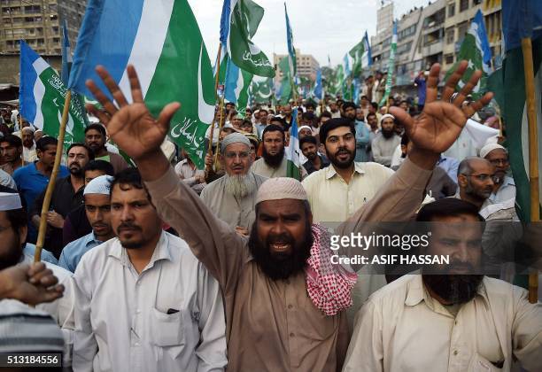 Supporters of Pakistan's Islamist party Jamaat-e-Islami shout slogans during a protest against the execution of convicted murderer Mumtaz Qadri in...