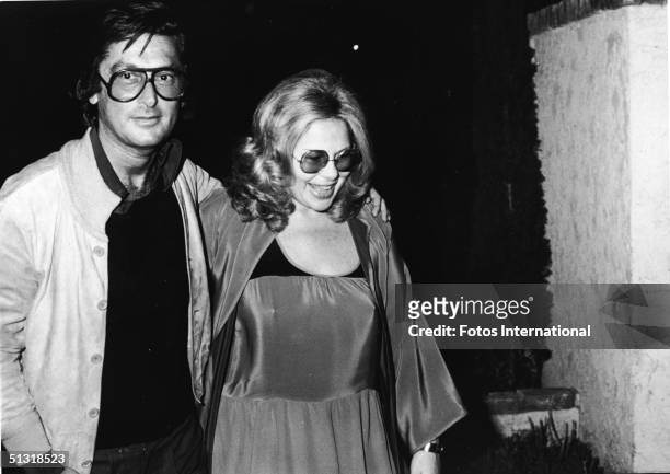 American film producer Robert Evans and his manager Sue Mengers arrive at The Backlot Room to see and hear singer Ellen March, May 1979.