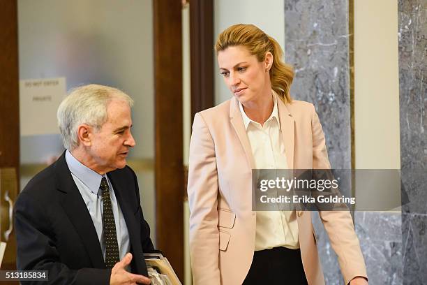 Sportscaster Erin Andrews, right, enters the courtroom on March 1, 2016 in Nashville, Tennessee. Andrews is suing her stalker and the owner and...
